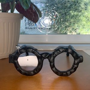 Decorative metal black glasses.